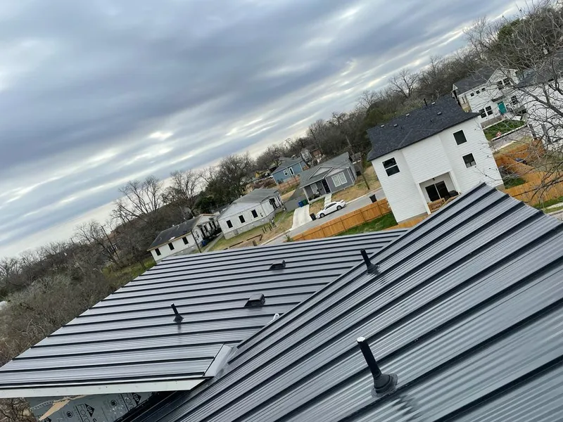 Standing seam metal roof panels with vents for Skylight Repair in Chesterland